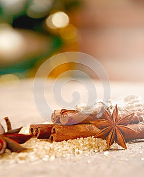 Close-up still-life of cinnamon and star anise on wooden boards background