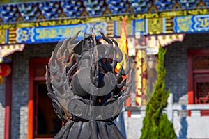 Close-up of stilted tower and incense burner in traditional Chinese ancient architecture