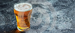 Close up stock photo beer glass with foam and water droplets, maximizing search relevance photo