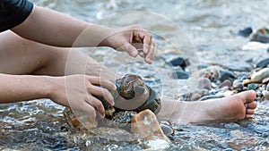 Close up stone arrangement by the river Vacation installments during the summer