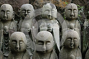 Close-up of Stone Buddha Statues in Rows