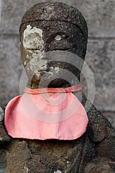 Close-up of stone Buddhist monk statue