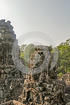 Close up of stone faces at Bayon Temple in Angkor Tom, Siem Reap, Cambodia