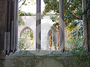Close-up of stone wall and gothic window at St Dunstan in the East church