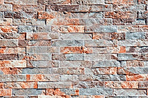 Close up of a stone wall texture, bricks with a pattern