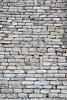 Close-up of stone wall use for construction business and designers. Stone backgrounds textured pattern abstract image.