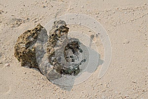 Close-up stones on sand background with copy space