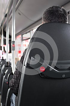 Close up of stop button on public transport bus