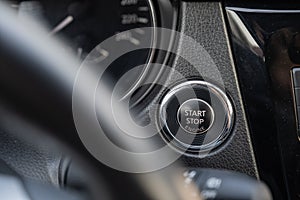 Close-up of stop start button car engine