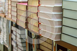 Close-up of stops of books, textbooks or fiction in book store, in library. Education, school, study, reading fiction