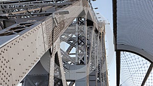 A close up of the Story bridge and safety fence crossing over the Brisbane river on a sunny day in Brisbane City Queensland on