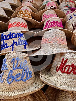 Close up of straw hats for sale in the souk of Marrakech at Places des Epices, Morocco.