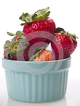 Close up of strawberries in blue bowl