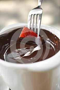 Close up strawberry and chocolate fondue