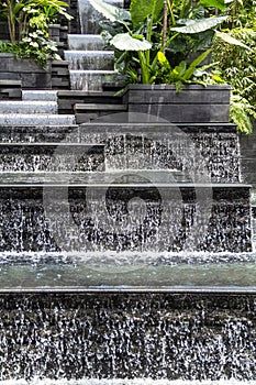 Close up of stream of waterfall located at the Jewel attraction in Terminal One of Singapore`s Changi airport.