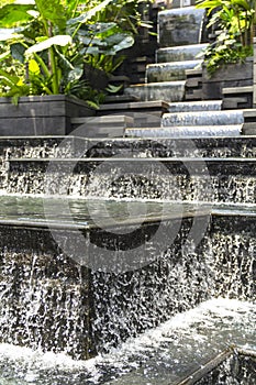 Close up of stream of waterfall located at the Jewel attraction in Terminal One of Singapore`s Changi airport.