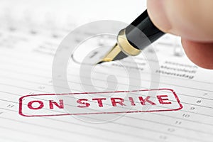 Close up of on strike stamp