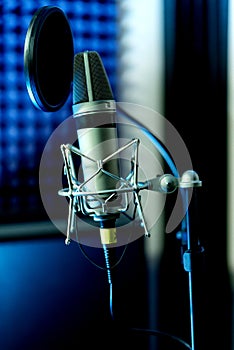 Close up studio condenser microphone with pop filter and anti.