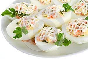 Close-up stuffed eggs with red fish