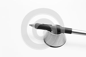 Close-up of stylus pen for graphic tablet on white background.