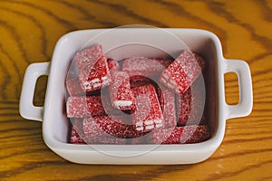 Close up of sugary candies as background. Jelly sweets in a bowl.