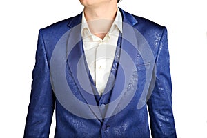 Close-up of suit blazer with blue patterned jacquard fabric