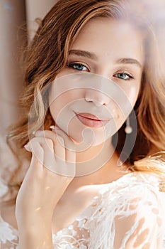 Close-up. sun glare. beautiful girl with long hair