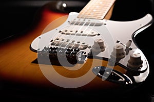 Close-up of a sunburst electric guitar