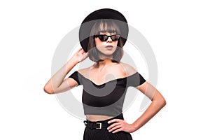 Close up sunny portrait of beautiful woman with fluffy hat brunette, smiling, having fun on the white wall