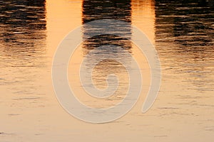 Close up of sunset water reflection