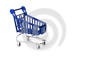 Close up of supermarket grocery push cart for shopping with black wheels and plastic elements on handle isolated on