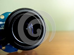 Close-up of a surveillance camera lens. Security concept