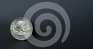 Close-up of Susan B Anthony US dollar coin on a gray backdrop photo