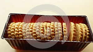 close up of sweet cookies in a plastic packet on table