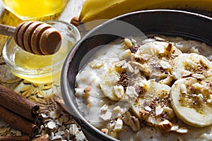 Close up of sweet homemade oatmeal porridge. healthy breakfast