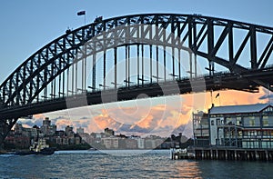 Close up of Sydney Harbour Bridge and surrounding wharves photo