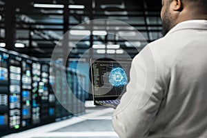 Close up of system administrator programming in AI data center