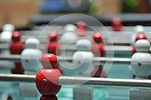 Close up of Table football game, Soccer table with red and white players