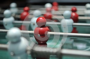 Close up of Table football game, Soccer table with red and white players