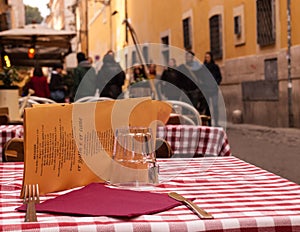 Close-up on a table of an outdoor Italian restaurant