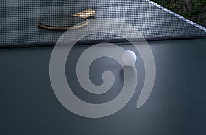 Close-up table tennis ball and racket.