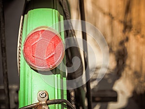 Close up of taillight of an old bicycle