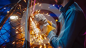 Close Up of a Talented Innovative Artist Using an Angle Grinder to Make an Abstract, Brutal and Ex