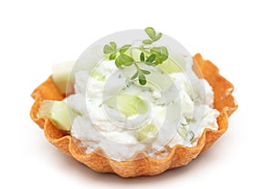 Close up tartlet filled with cream cheese photo