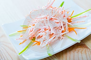 Close up of tasty dish of fresh vsalad with carrots, garlic and greek yogurt