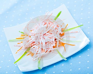 Close up of tasty dish of fresh vsalad with carrots, garlic and greek yogurt