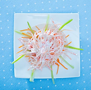 Close up of tasty dish of fresh vsalad with carrots, garlic and greek yogurt