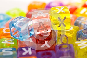 Close-up Of TAX Word On Plastic Blocks