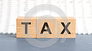 Close-up with Tax word on wooden blocks