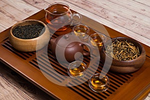 Close-up of tea set and wooden bowls